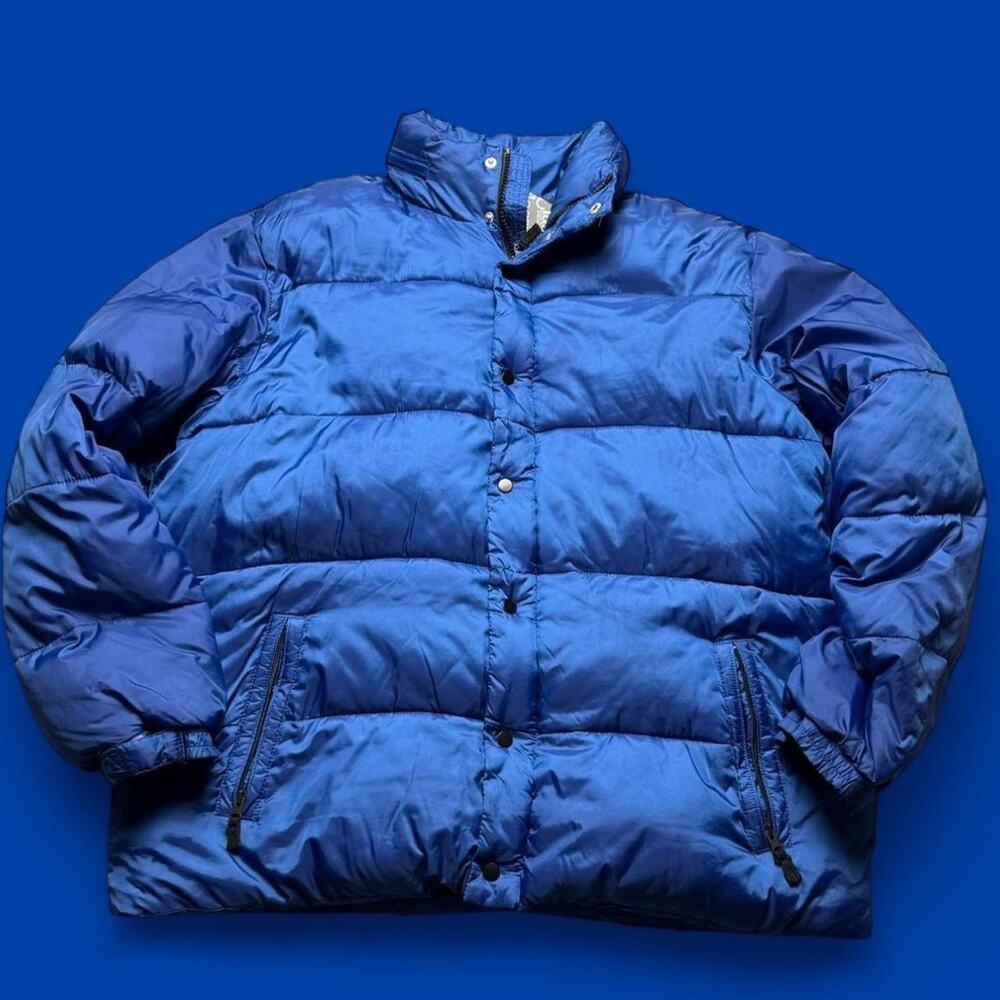 Blue puffer jacket with a